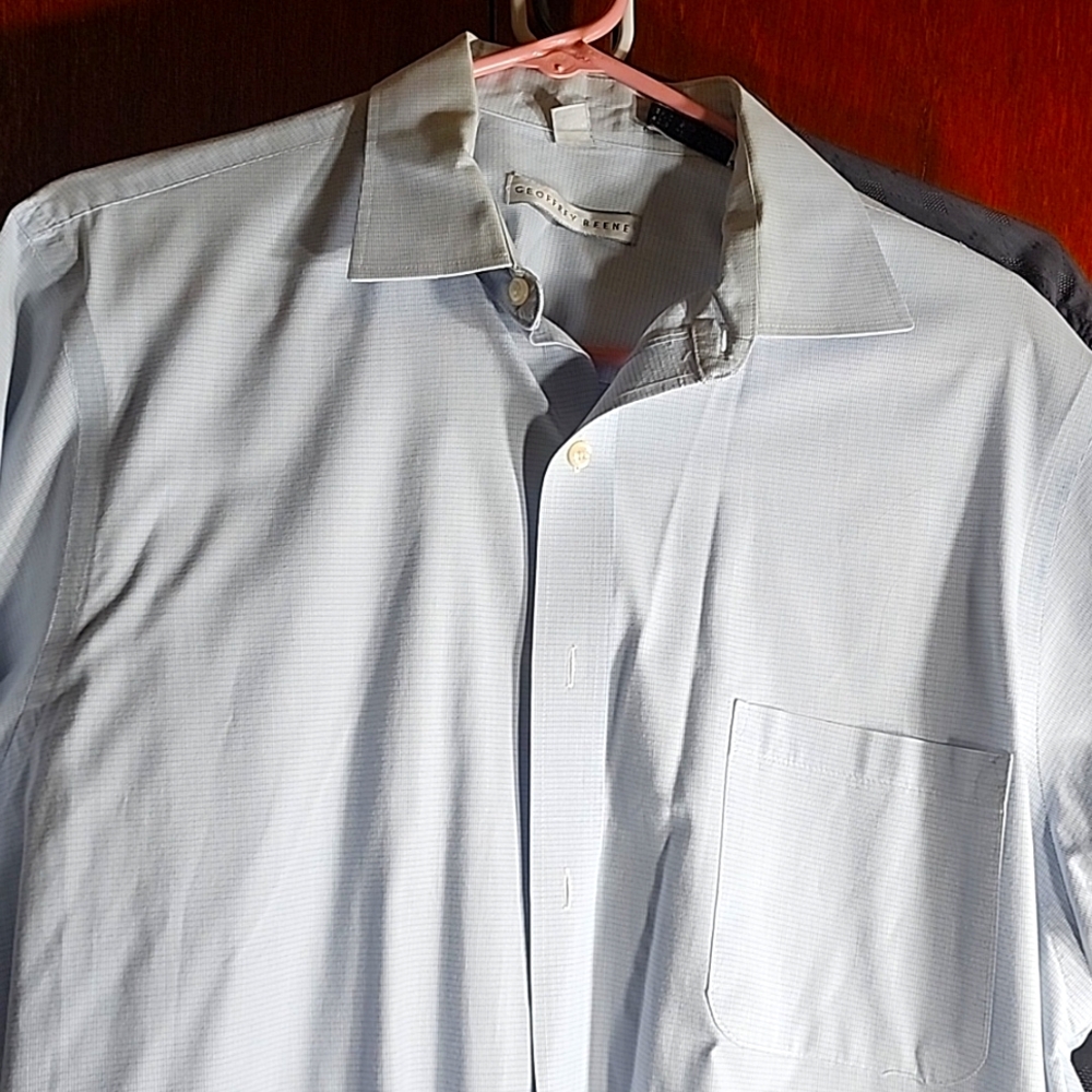 im selling a light blue checkered button down shirt
